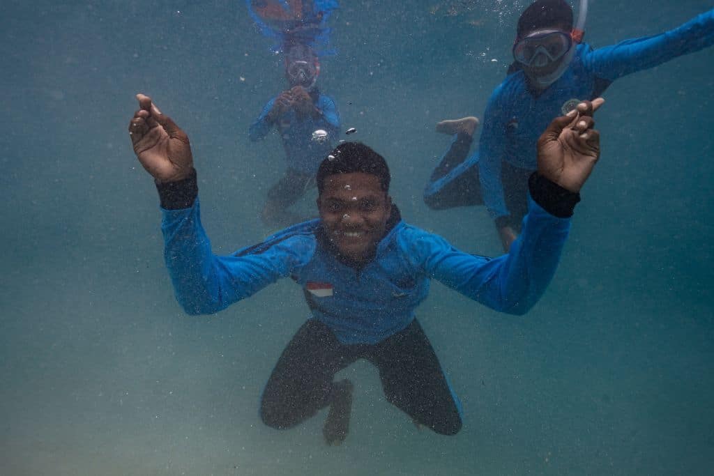 Diving with local students to see the world through their eyes.