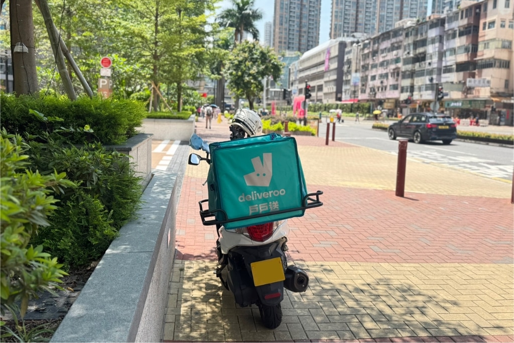 A Hong Kong food delivery rider says companies offer little support for heat protection.