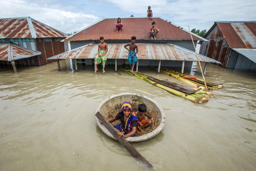 Houses are nearly submerged due to flooding in Sirajganj, Bangladesh, in 2020.