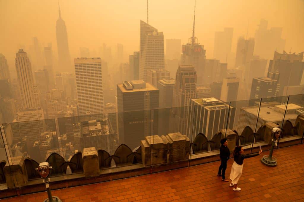 Smoke from wildfires in Quebec, Canada, blanket New York in a thick, orange haze on June 7, 2023.